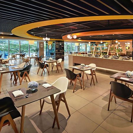 הו צ'י מין סיטי Novotel Living Saigon South מראה חיצוני תמונה