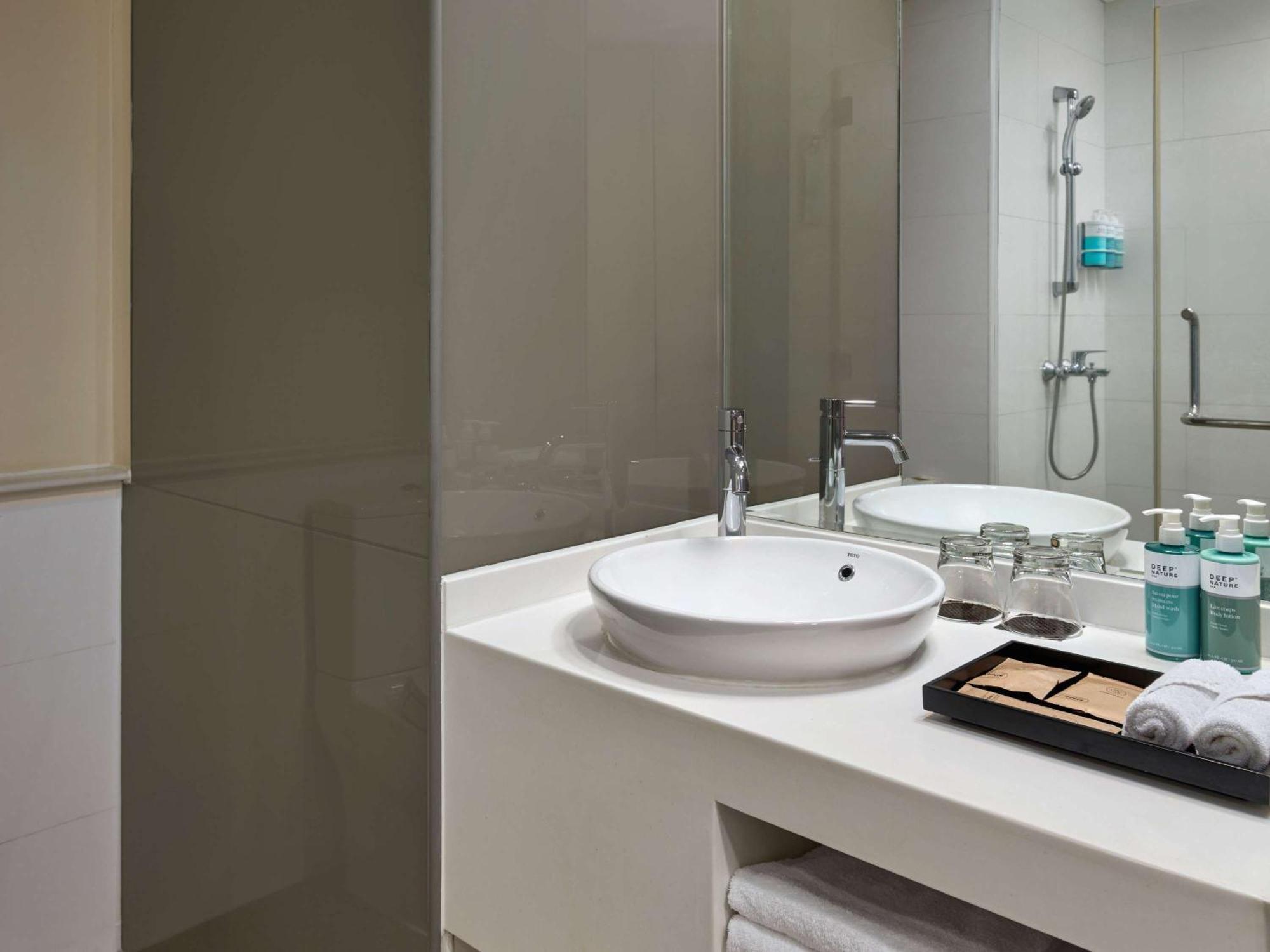 הו צ'י מין סיטי Novotel Living Saigon South מראה חיצוני תמונה