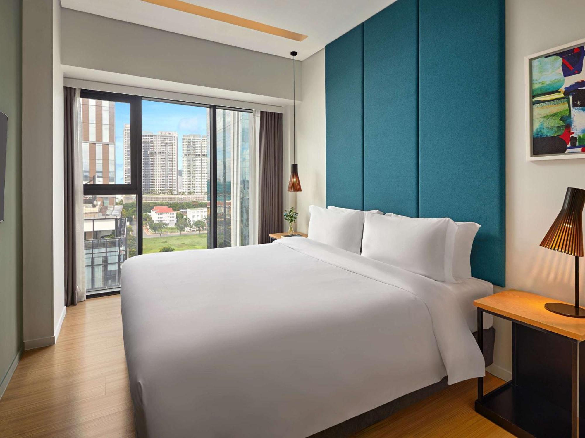 הו צ'י מין סיטי Novotel Living Saigon South מראה חיצוני תמונה