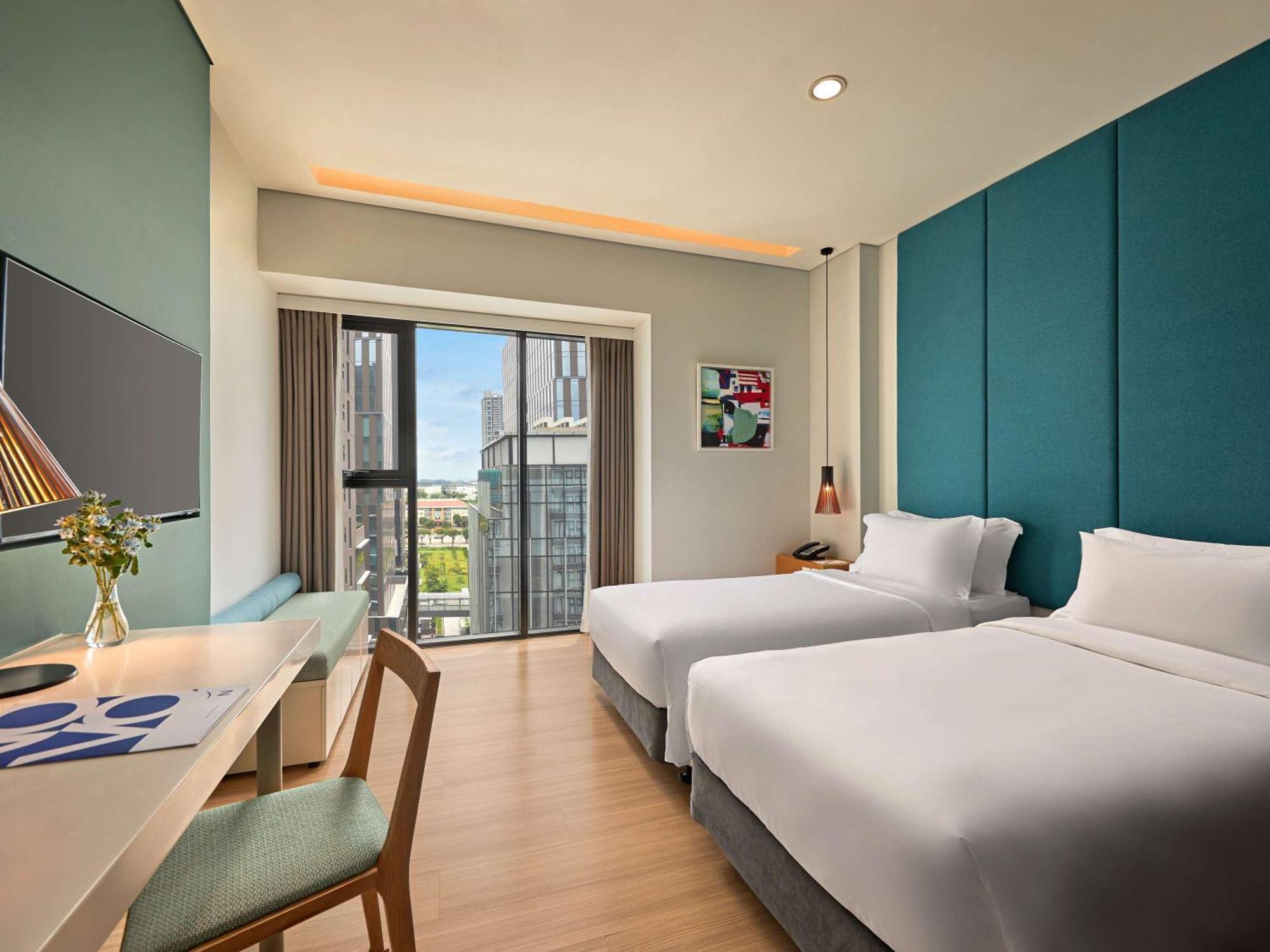 הו צ'י מין סיטי Novotel Living Saigon South מראה חיצוני תמונה