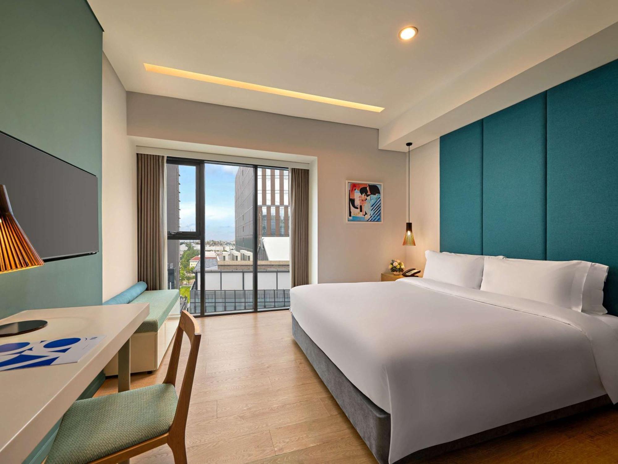 הו צ'י מין סיטי Novotel Living Saigon South מראה חיצוני תמונה