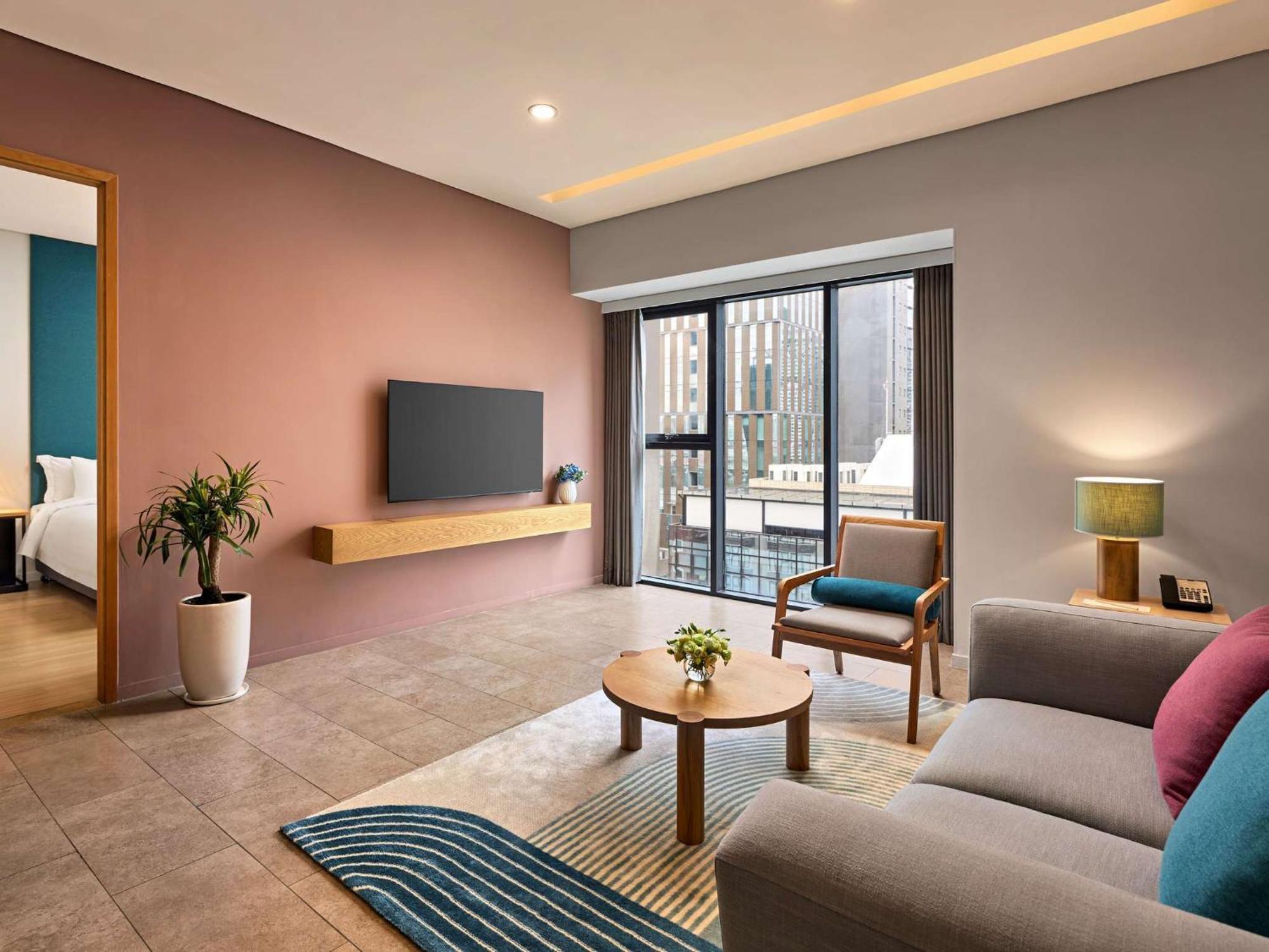 הו צ'י מין סיטי Novotel Living Saigon South מראה חיצוני תמונה