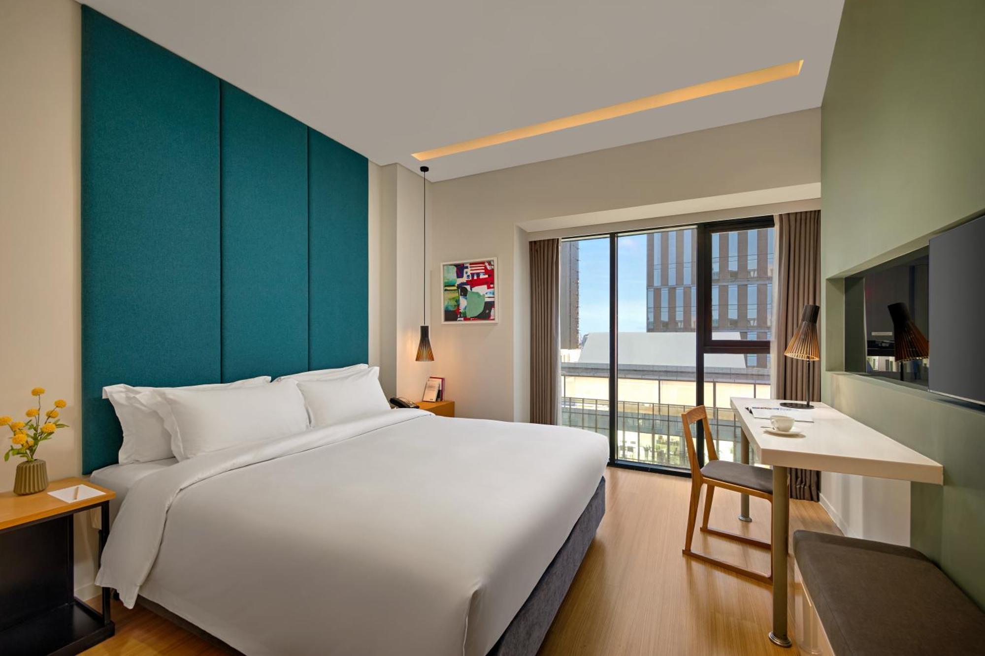 הו צ'י מין סיטי Novotel Living Saigon South מראה חיצוני תמונה