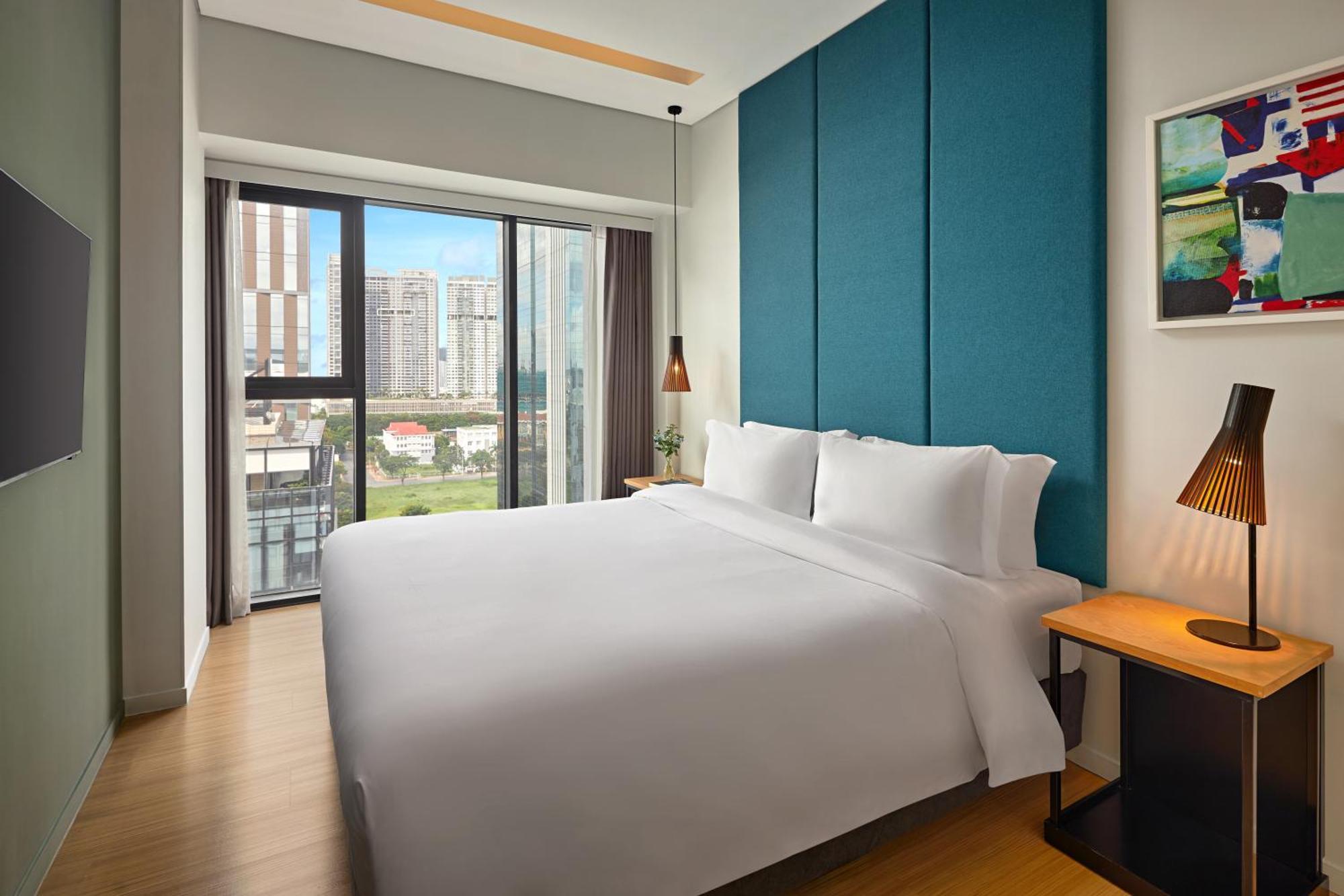 הו צ'י מין סיטי Novotel Living Saigon South מראה חיצוני תמונה