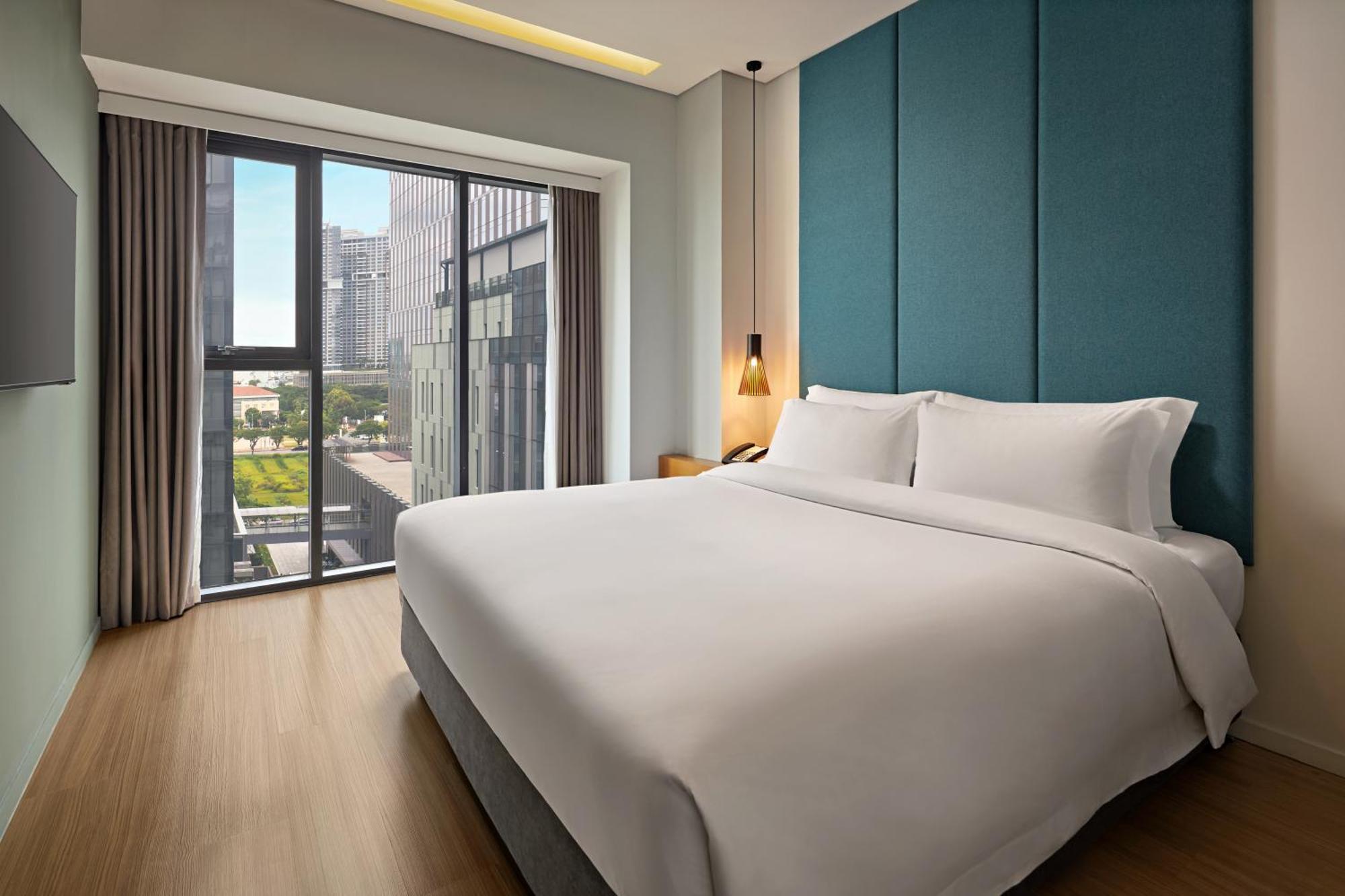 הו צ'י מין סיטי Novotel Living Saigon South מראה חיצוני תמונה