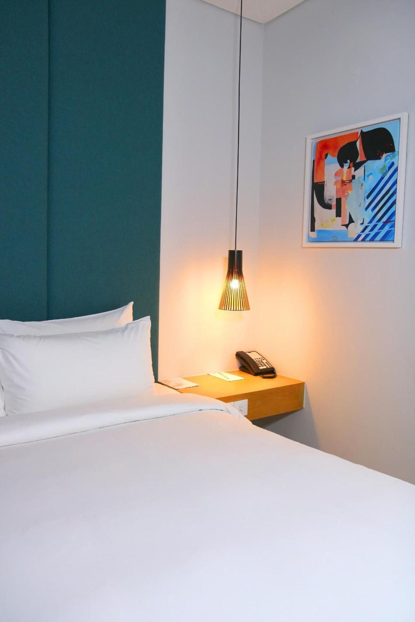 הו צ'י מין סיטי Novotel Living Saigon South מראה חיצוני תמונה